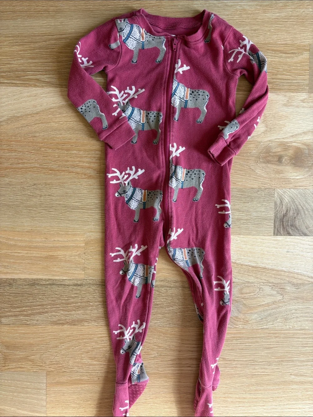 TEA COLLECTION | Berry Red Footed One-Piece with Reindeer Print